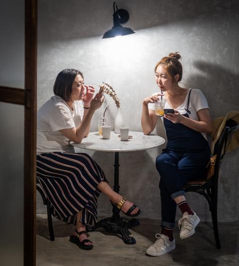 Chatting in a coffee shop in Thailand